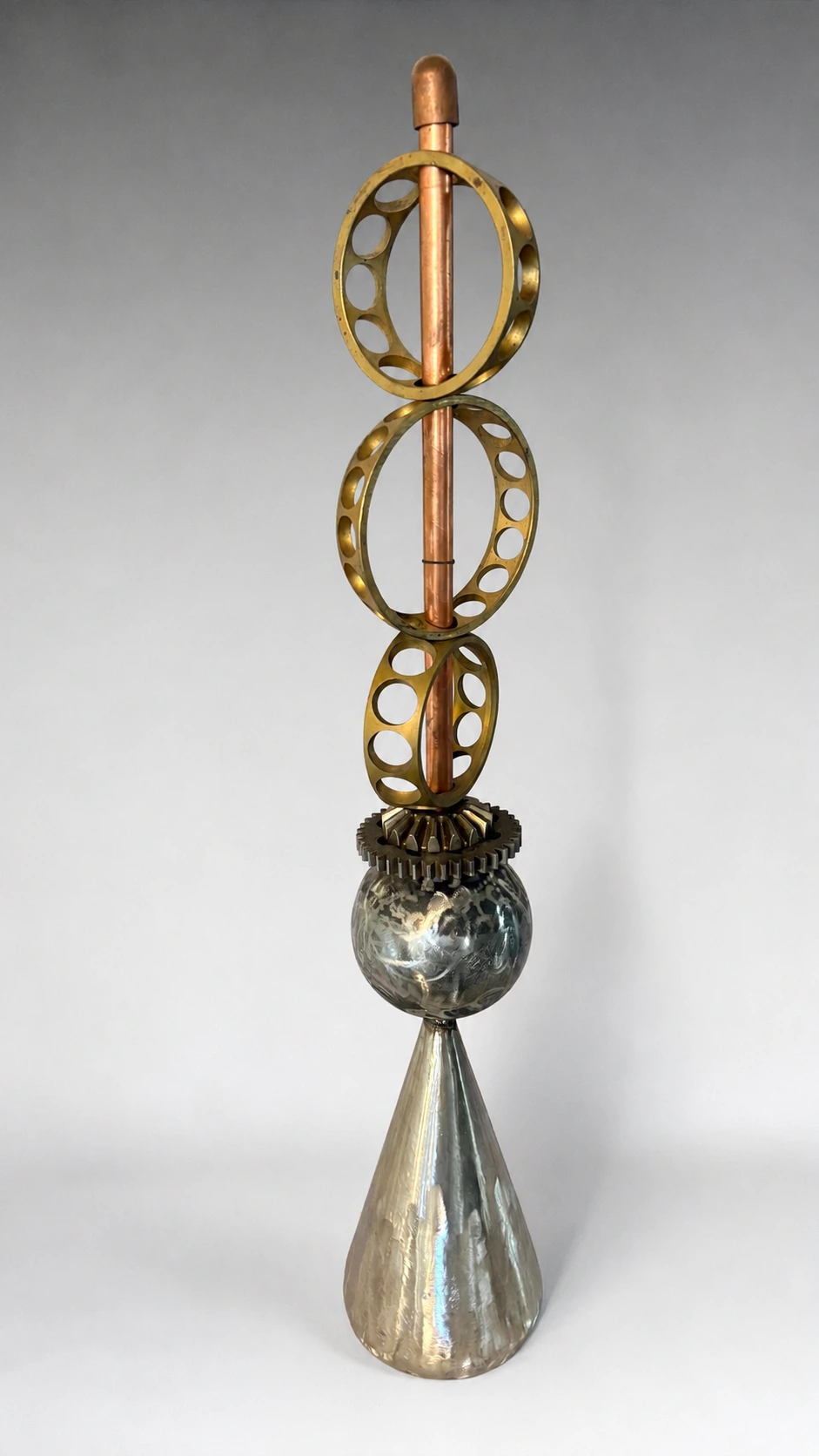 Cone Series sculpture by Michael Herold featuring three stacked ring forms supported by industrial-inspired geometry above a sphere and cone foundation, designed as a monumental public art concept with potential for kinetic interaction and landmark-scale installation.
