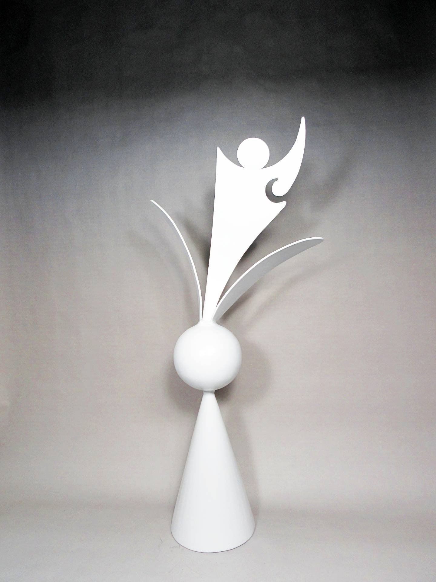 White metal sculpture from the Cone Series featuring a conical base, a sphere, and an upward-reaching abstract figure with curved elements. By Michael Herold.
