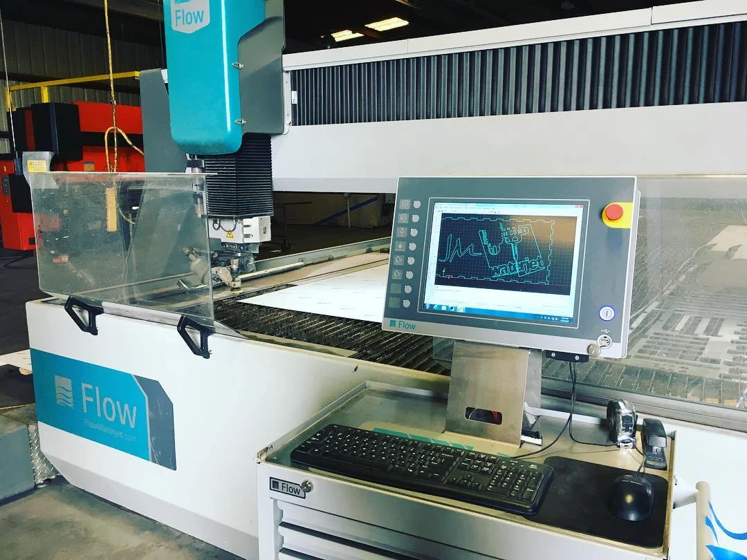 Digital CNC steel fabrication system producing precision structural components for monumental sculpture and architectural installations.