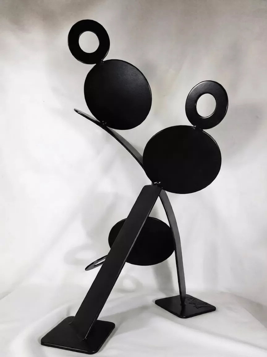 Contemporary black steel sculpture titled “Sweeping” combining geometric balance, curved metal forms, minimalist modernism, and architectural sculptural design for luxury residential and commercial interiors.